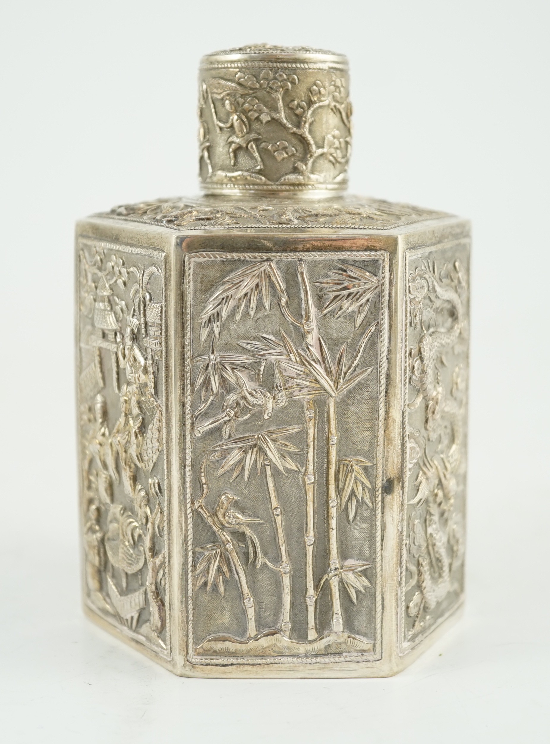 A late 19th century Chinese Export silver hexagonal tea caddy and cover, by Cumwo